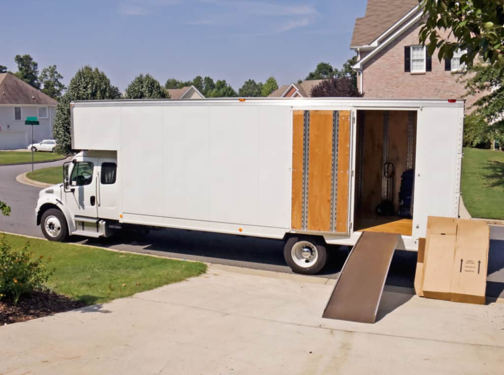 moving truck in driveway