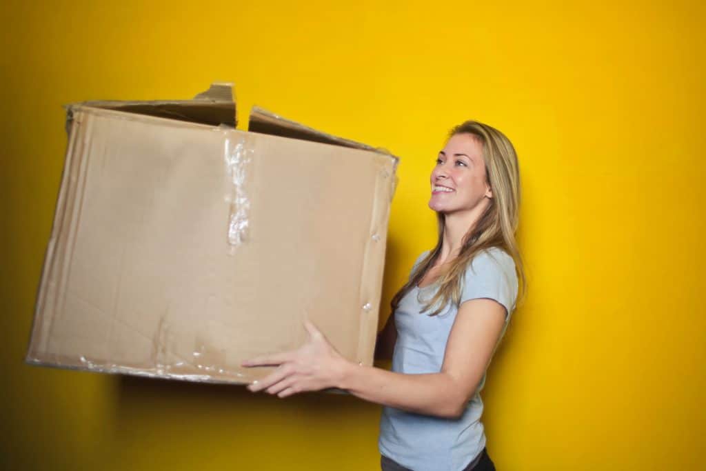 woman holding a box